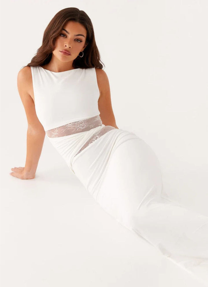 Larra – Figure Hugging Maxi Dress with Cutouts and Lacing
