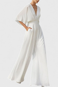 Isaura Chic Jumpsuit with Cape Sleeves and V-Neck Design